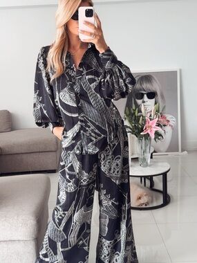 Luxxel Black & White Patterned Wide-Leg Jumpsuit size S for tall Girl